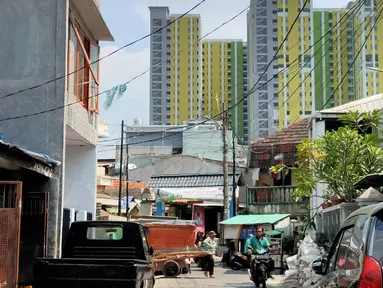 Pemandangan proyek Rusunawa Pasar Rumput yang hampir selesai pengerjaannya di Jakarta, Selasa (16/7/2019). Proyek yang dimulai sejak 2016 lalu tersebut memiliki 1.984 unit hunian serta 1.314 kios. (Liputan6.com/Immanuel Antonius)