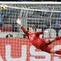 Kiper Jerman, Marc-Andre Ter Stegen, berusaha menghalau bola saat melawan Argentina pada laga persahabatan di Stadion Signal Iduna Park, Rabu (9/10). Kedua tim bermain imbang 2-2. (AP/Martin Meissner)