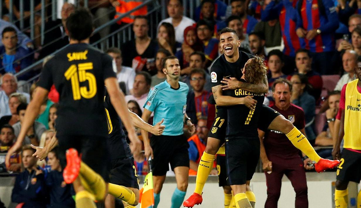 Ekspresi pemain Atletico Madrid, Angel Correa, setelah mencetak gol ke gawang Barcelona dalam laga pekan kelima La Liga Spanyol musim ini di Camp Nou, Kamis (22/9/2016) dini hari WIB. Skor berakhir imbang 1-1. (Reuters/Albert Gea)