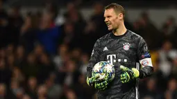 1. Manuel Neuer - Manuel Neuer tampil mengagumkan bersama Bayern Munchen di kompetisi Liga Champions. Kiper berusia 34 tahun ini memiliki rekor 33 clean sheets dan meraih penghargaan Kiper Terbaik Dunia IFHHS serta kiper terbaik versi UEFA. (AFP/Glyn Kirk/IKIMAGES)