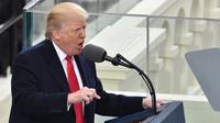 Donald Trump dalam pidato pertamanya sebagai Presiden AS mengatakan semua kebijakannya mulai hari ini akan selalu mengedepankan kepentingan warga Amerika, Washington DC, AS, Jumat (20/1). (AFP Photo)