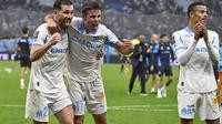Selebrasi skuad&nbsp;Marseille&nbsp;dalam laga versus PSG di Ligue 1 2025/2026, Selasa (23/9/2025). (AP Photo/Philippe Magoni)