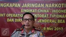 Kapolri Jenderal Tito Karnavian memberi keterangan kepada awak media saat barang bukti beserta tersangka kasus jaringan narkotika asal China di Rumah Sakit Polri, Kramat Jati, Jakarta Timur, Senin (8/5). Liputan6.com/Immanuel Antonius)