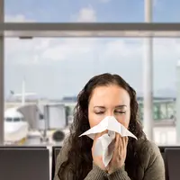 Nyaman Bepergian dengan Pesawat Saat Sedang Pilek (Cunaplus/Shutterstock)