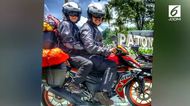 Pasangan dari Malaysia ini kunjungi 25 negara di Eropa dengan menggunakan motor bebek.