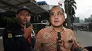 Sekretaris Direktorat Jenderal Ketenagalistrikan ESDM‎ Arief Indarto setelah menjalani pemeriksaan di gedung KPK, Jakarta, Jumat (19/12/2014). (Liputan6.com/Miftahul Hayat)
