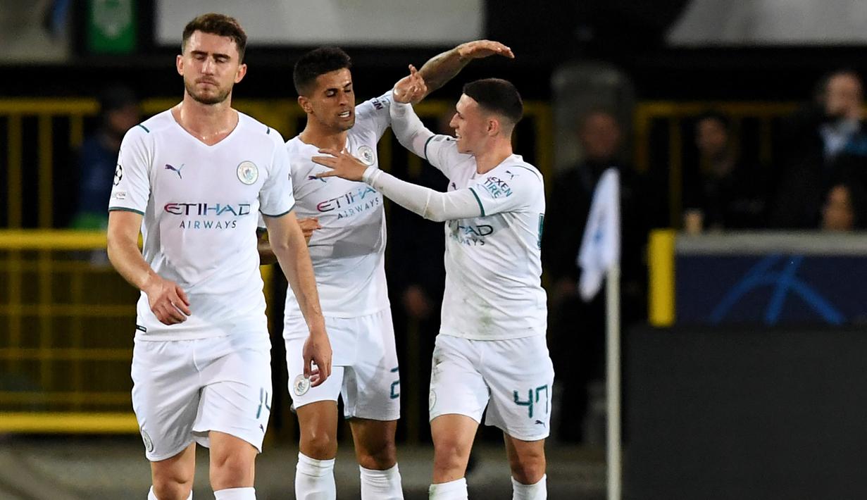 Joao Cancelo. Di matchday ketiga Grup A, Man City dijamu Club Brugge, 19 Oktober 2021. Dalam laga yang berakhir 5-1 untuk kemenangan Man City, Joao Cancelo yang menjadi pencetak gol pertama terpilih menjadi Man of The Match berkat mobilitasnya sebagai seorang fullback. (AFP/John Thys)