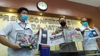 Konferensi pers Polda Jatim terkait penangkapan dua pelaku peretas website KPU Kabupaten Jember. (Foto: Liputan6.com/Dian Kurniawan)