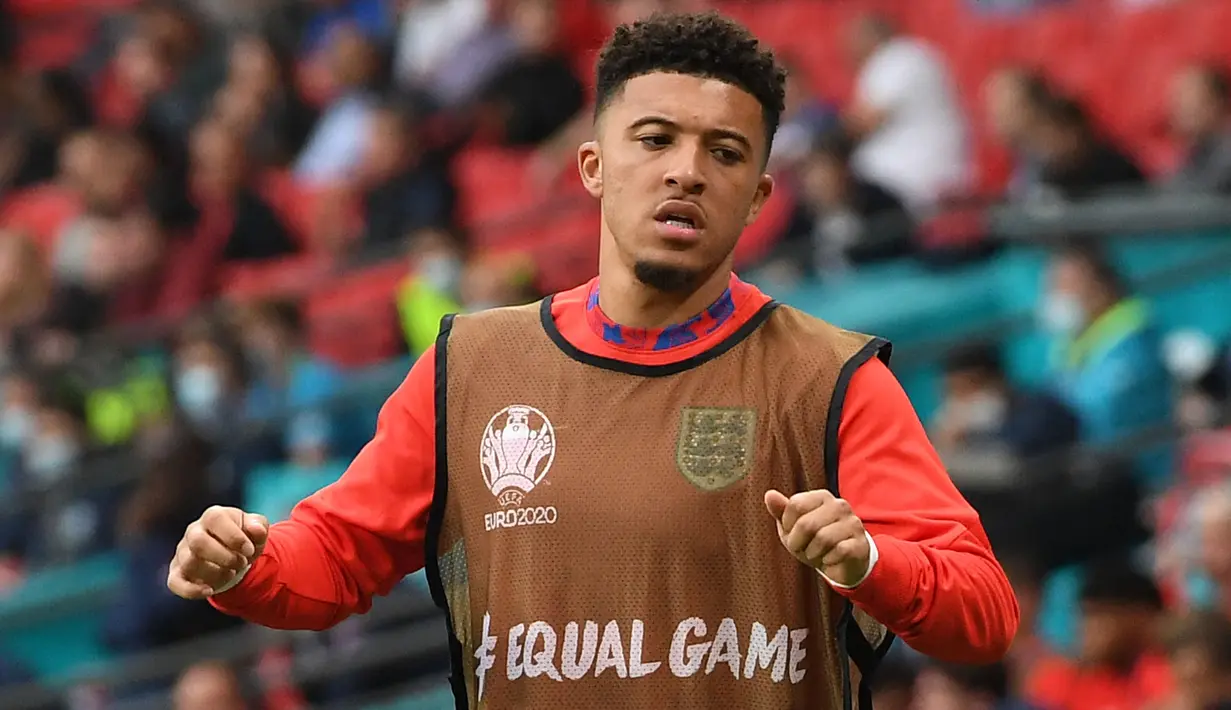 Jadon Sancho menjadi pemain anyar yang akan dinantikan penampilannya oleh fans Manchester United. Ia digadang-gadang akan menjalani debutnya kala MU melawan Leeds United pada Sabtu, 14 Agustus 2021. Sebelumnya, Ia merupakan pemain muda yang impresif di Borussia Dortmund. (Foto: AFP/Pool/Andy Rain)