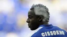 FC Porto's player Aly Cissokho celebrates with his hair painted, the victory in the Portuguese league title 2009 before the Portuguese First league football match against SC Braga at the Dragao Stadium on May 24, 2009. AFP PHOTO/MIGUEL RIOPA 