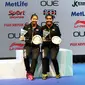 Ganda putri Indonesia Greysia Polii/Nitya Krishinda Maheswari meraih titel juara Singapore Open Super Series 2016 setelah Misaki Matsutomo/Ayaka Takahashi dari Jepang mengundurkan diri, Minggu (17/4/2016). (Liputan6.com/Humas PP PBSI)