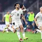 Timnas Mesir berhasil lolos ke final Piala Afrika 2021 setelah mengalahkan Kamerun lewat adu penalti dengan skor 3-1 di Olembe Stadium, Yaounde, Jumat (4/2/2022) dini hari WIB. (AFP/CHARLY TRIBALLEAU)