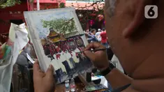 Anggota komunitas pelukis cat air Indonesia melukis suasana perayaan Imlek di Vihara Dharma Bhakti, Petak Sembilan, Jakarta Barat, Sabtu (25/1/2020). Kegiatan melukis tersebut untuk memeriahkan perayaaan Tahun Baru Imlek 2571. (Liputan6.com/Angga Yuniar)