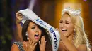 Ekspresi Miss North Dakota 2017, Cara Mund saat dinobatkan sebagai Miss America 2018 di Boardwalk Hall Arena di Atlantic City, New Jersey (10/9). (AP Photo/ Noah K. Murray)