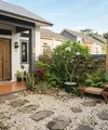 Gaya taman kering estetik ala resort di rumah mungil jadi ekslusif (AI Generated)