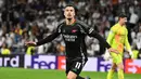 Pada masa tambahan waktu, atau menit ke-90+3, Gabriel Martinelli mencetak gol kemenangan untuk Arsenal. Skor 2-1 bertahan hingga peluit akhir dibunyikan. (JAVIER SORIANO/AFP)