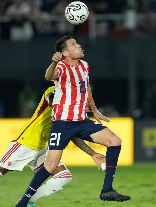 Kolombia mengoleksi 12 poin dari enam laga, sama dengan Albiceleste yang tengah bertanding melawan Brasil. (AP Photo/Jorge Saenz)