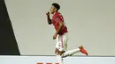 Gelandang Manchester United, Jesse Lindgard berselebrasi usai mencetak gol ke gawang LASK pada pertandingan leg kedua babak 16 besar Liga Europa di Stadion Old Trafford, Inggris (6/8/2020). MU menang 2-1 atas Lask dan melaju ke perempat final.  (AP Photo/Dave Thompson)