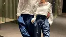 <p>Zara mengenakan blouse dan high waist pants, sementara Abimanyu atau yang akrab disapa Kakang ini memadukan kemeja putih dan celana panjang warna biru yang senada dengan Zara. (Instagram/zaraadhsty).</p>