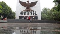 Suasana Monumen Pancasila Sakti di Lubang Buaya, Jakarta Timur, Jumat (1/10/2021). Monumen Pancasila Sakti menjadi salah satu tempat untuk mengenang jasa pahlawan pada Hari Kesaktian Pancasila berkaitan dengan peristiwa G30S. (Liputan6.com/Herman Zakharia)