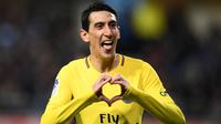 Striker Paris Saint-Germain (PSG), Angel Di Maria, melakukan selebrasi usai mencetak gol ke gawang Troyes pada laga Liga 1 Prancis di Stadion Aube, Sabtu (2/2/2018). Troyes takluk 0-2 dari PSG. (AFP/Franck Fife)