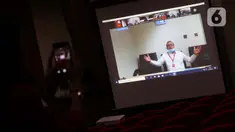 Layar monitor menampilkan Ketua Umum Partai Amanat Nasional (PAN), Zulkifli Hasan saat menjadi saksi secara daring pada sidang dugaan korupsi pengajuan revisi alih fungsi hutan menjadi lahan sawit di Provinsi Riau pada 2014, Gedung KPK Jakarta, Selasa (11/8/2020). (Liputan6.com/Helmi Fithriansyah)