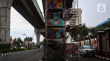 Mural terlihat di kawasan Lapangan Bhayangkara, Mabes Polri, Jakarta, selasa (2/11/2021). Selama ini seni mural kurang mendapatkan tempat di fasilitas-fasilitas umum dan Pembuatan Mural ini bagian dalam rangka Bhayangkara Mural Festival 2021. (Liputan6.com/Johan Tallo)