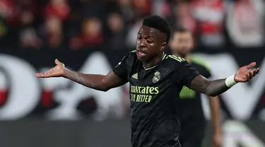 Ekspresi penyerang Real Madrid, Vinicius Junior saat pertandingan sepak bola Liga Spanyol melawan Rayo Vallecano de Madrid di Stadion Vallecas, distrik Madrid, Puente de Vallecas, 7 November 2022. (Pierre-Philippe Marcou/AFP)