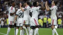 Para pemain Real Madrid merayakan gol ketiga yang dicetak oleh gelandang asal Inggris, Jude Bellingham (nomor punggung 5), dalam pertandingan Liga Spanyol antara Real Madrid CF dan Rayo Vallecano de Madrid di Stadion Santiago Bernabeu, Madrid, pada 13 September 2026. (Oscar DEL POZO/AFP)