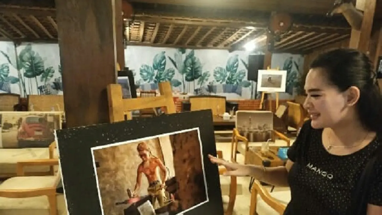 Pameran karya foto jurnalistik Jurnalis Foto Nusantara (JFN) Bojonegoro. (Ahmad Adirin/Liputan6.com)