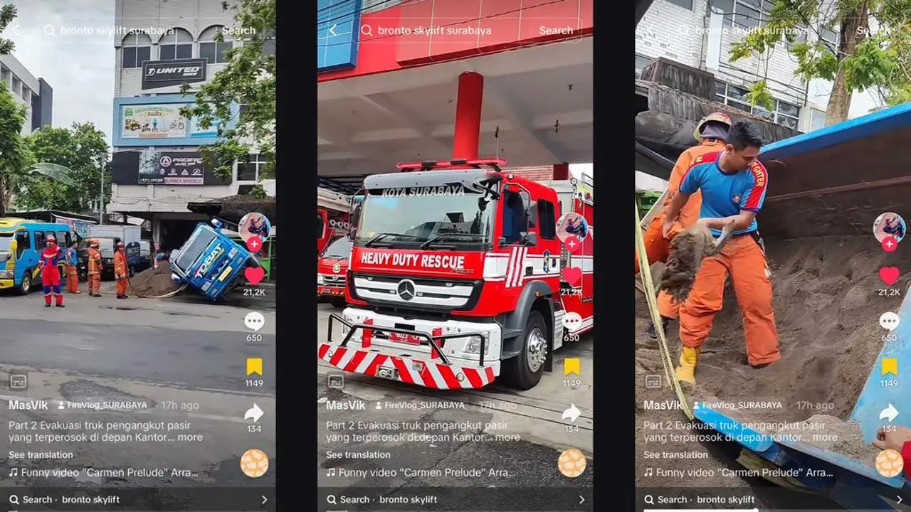 Petugas Damkar Bantu Truk Muatan Pasir di depan Kantor Damkar