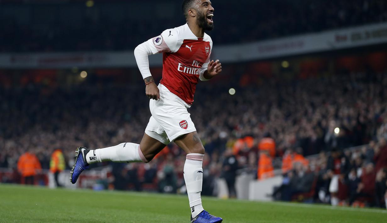 7. Alexandre Lacazette (Arsenal) - 12 gol dan 7 assist (AFP/Ian Kington)