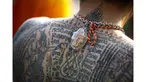 Tato ini dipercaya akan membawa manfaat baik di kehidupan selanjutnya.
