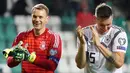 Kiper Jerman Manuel Neuer (kiri) dan bek Jerman Niklas Suele merayakan kemenangan  setelah pertanginan melawan Estonia pada grup C kualifikasi Euro 2020 di Tallinn, Estonia (13/10/2019). Jerman menang telak 0-3 atas Estonia. (AFP Photo/Janek Skarzynski)