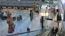 Pandangan umum ruang keberangkatan yang hampir kosong karena jumlah pengunjung menurun drastis di Bandara Suvarnabhumi di Bangkok, Rabu (11/3/2020). Di Thailand sendiri lebih dari 50 orang terinfeksi virus corona COVID-19 yang telah menggemparkan seluruh dunia. (Mladen ANTONOV/AFP)