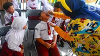 Kementerian Kesehatan Republik kembali menggelar Pekan Imunisasi Nasional (PIN) Polio. (merdeka.com/Arie Basuki)