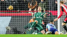 Berkat hasil ini, Arsenal berhak naik ke peringkat dua klasemen dengan poin 39. Sementara itu, Brentford kini menduduki peringkat 12 dengan perolehan poin 24. (AP Photo/Kirsty Wigglesworth)
