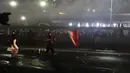 Massa dari berbagi elemen mahasiswa  dan masyarakat disemprot  water canon di depan Gedung DPR/MPR, Jakarta, Kamis, 27 Agustus 2026. (KLY/ Arie Basuki)