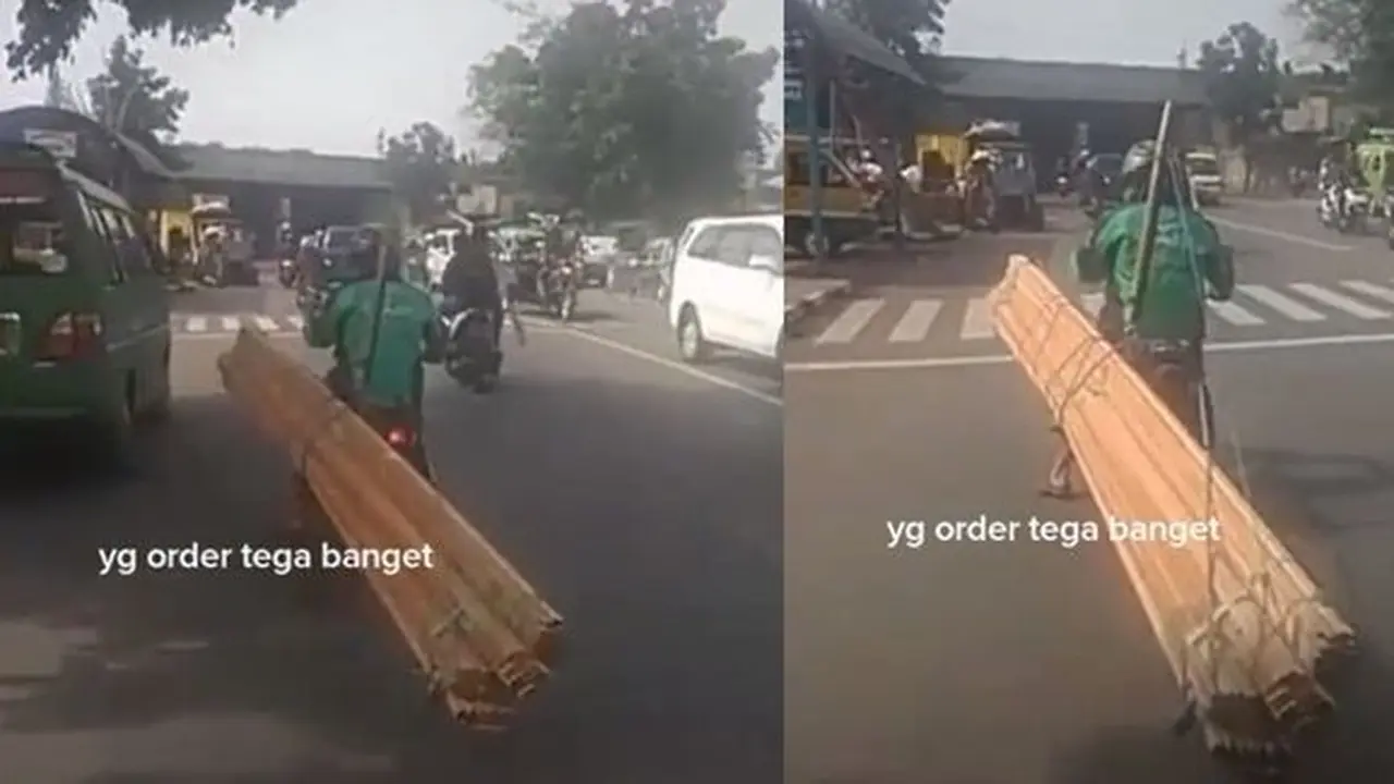 Driver ojol angkut balok kayu
