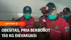Evakuasi pria berbobot 150 kilogram berlangsung dramatis. Korban diturunkan menggunakan tandu dan tali dari lantai dua, karena akses tangga rumah yang sempit.