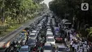 Kendaraan terjebak kemacetan di kawasan Jalan Thamrin dan Merdeka Barat, Jakarta, Senin (2/12/2019). Sejumlah ruas jalan di Jakarta mengalami kemacetan parah akibat aksi reuni 212 di kawasan Monas. (Liputan6.com/Faizal Fanani)