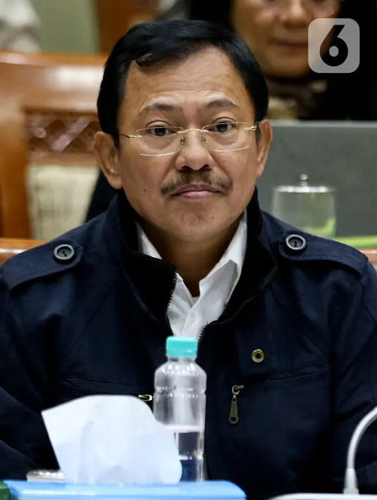 Menteri Kesehatan, Terawan Agus Putranto mengikuti rapat kerja bersama Komisi IX DPR RI di Kompleks Parlemen, Senayan, Jakarta, Senin (3/2/2020). Rapat membahas upaya perlindungan kesehatan Warga Negara Indonesia yang berada di China dan negara lain terkait virus corona. (Liputan6.com/Johan Tallo)