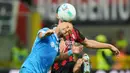 AC Milan unggul di laga ini berkat gol Alexis Saelemaekers dan Christian Pulisic di babak pertama. Namun Napoli mampu memperkecil kedudukan berkat gol Kevin De Bruyne. (AP Photo/Luca Bruno)