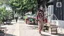 Pejalan kaki melintas di trotoar kawasan Lapangan Banteng, Jakarta, Senin (7/9/2020). Sembilan titik tersebut antara lain berada di Jalan Pamekasan, Jalan Kendal, Jalan Gedung Kesenian, Lapangan Banteng, dan Jalan Sudirman. (merdeka.com/Iqbal S. Nugroho)
