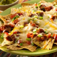 Jadikan cheesy nachos sebagai hidangan favorit keluarga. Ini resepnya! (Via: sargento.com)