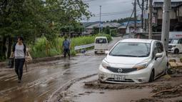 Hujan deras yang melanda wilayah tengah Jepang menyebabkan banjir dan tanah longsor. Satu orang dikabarkan tewas. (Yuichi YAMAZAKI/AFP)