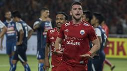 Striker Persija Jakarta, Marko Simic, merayakan gol yang dicetaknya ke gawang Arema FC pada laga Liga 1 di SUGBK, Jakarta, Sabtu (31/3/2018). Persija menang 3-1 atas Arema FC. (Bola.com/Vitalis Yogi Trisna)