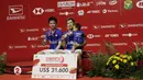 Ganda Putra Indonesia, Kevin Sanjaya/Marcus Fernaldi, melakukan selebrasi usai menaklukkan Mohammad Ahsan/Hendra Setiawan, pada laga final Daihatsu Indonesia Masters 2020 di Istora, Jakarta, Minggu (19/1). Kevin/Marcus menang 21-15, 21-16. (Bola.com/M Iqbal Ichsan)