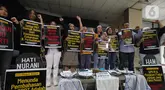 Aliansi Mogok Makan Untuk Undang Undang Perlindungan Pekerja Rumah Tangga (UU PPRT) menggelar aksi mogok makan bergilir atau berpuasa massal di Gedung YLBHI, Jakarta, Minggu (6/7/2023). (merdeka.com/Arie Basuki)