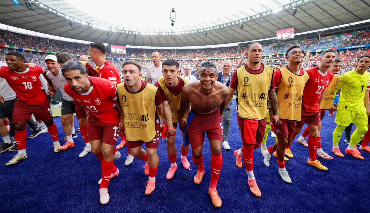 Kemenangan ini mengantar Swiss ke babak delapan besar Euro 2024. Swiss menunggu pemenang laga antara Inggris dan Slovakia. (Axel Heimken/AFP)